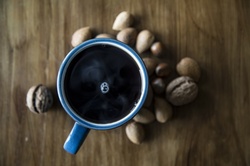 Cup of Coffee on Wooden Background