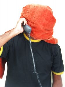 Man with towel on head