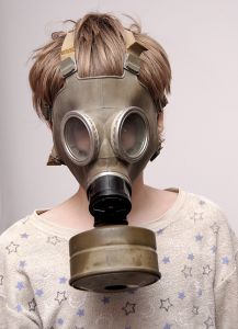 Boy in gas mask