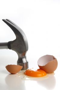 Hammer on egg
