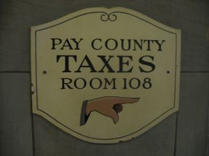 Pay taxes (sign)