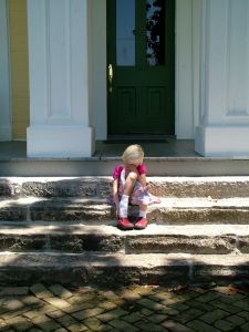 Sad girl on steps